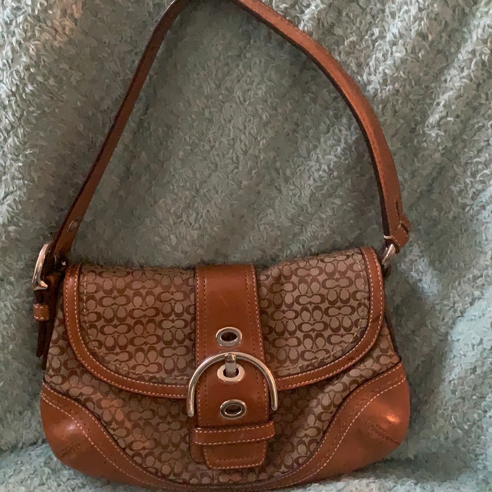 Smaller brown classic Coach purse